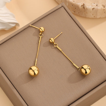 Collana sfere dorate con nappa