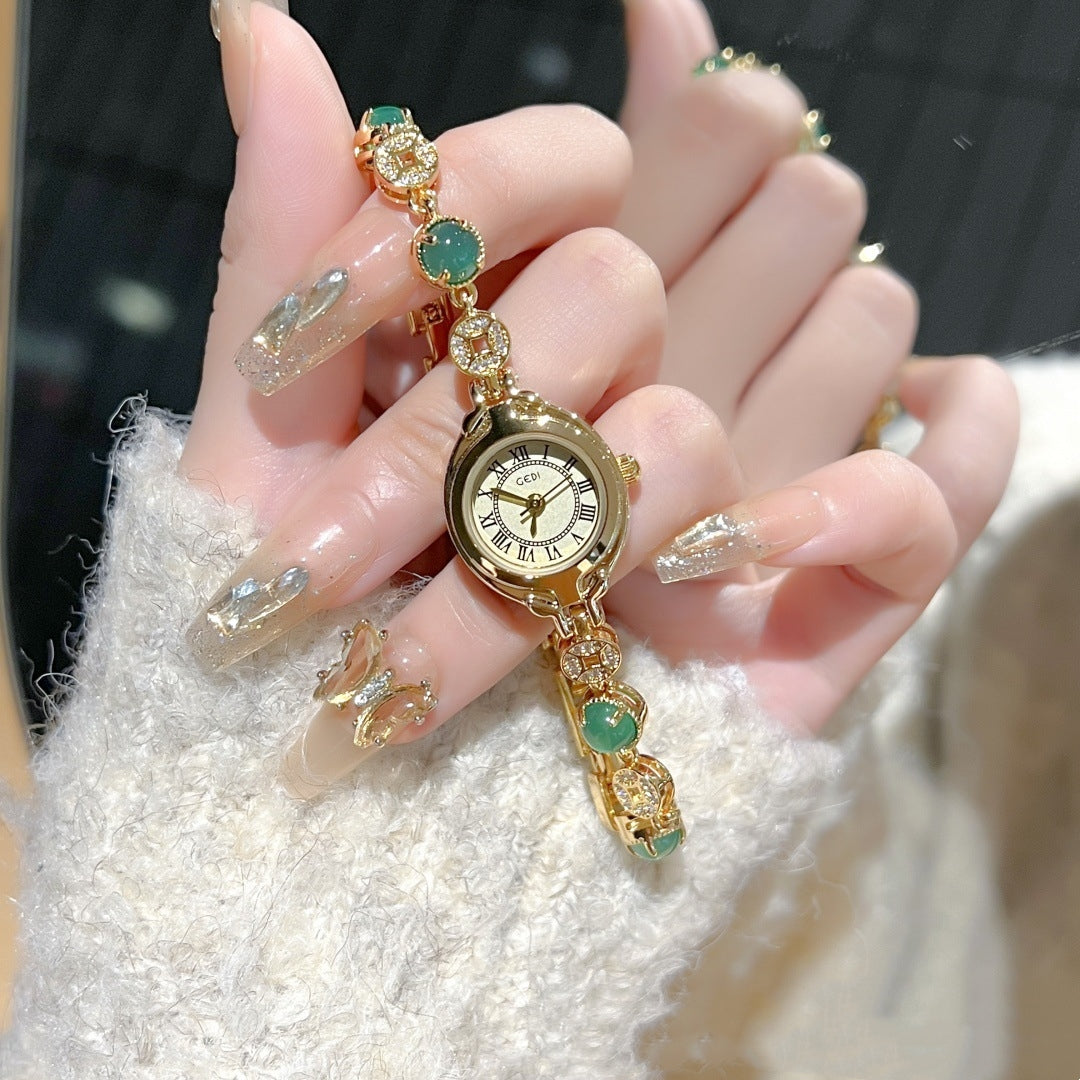 Orologio dorato vintage raffinato