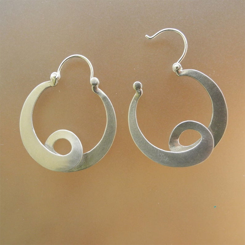 Orecchini curvi geometrici