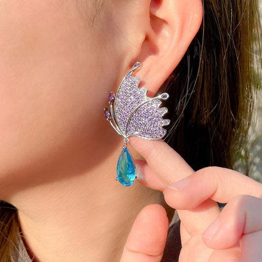 Orecchini farfalla blu strass