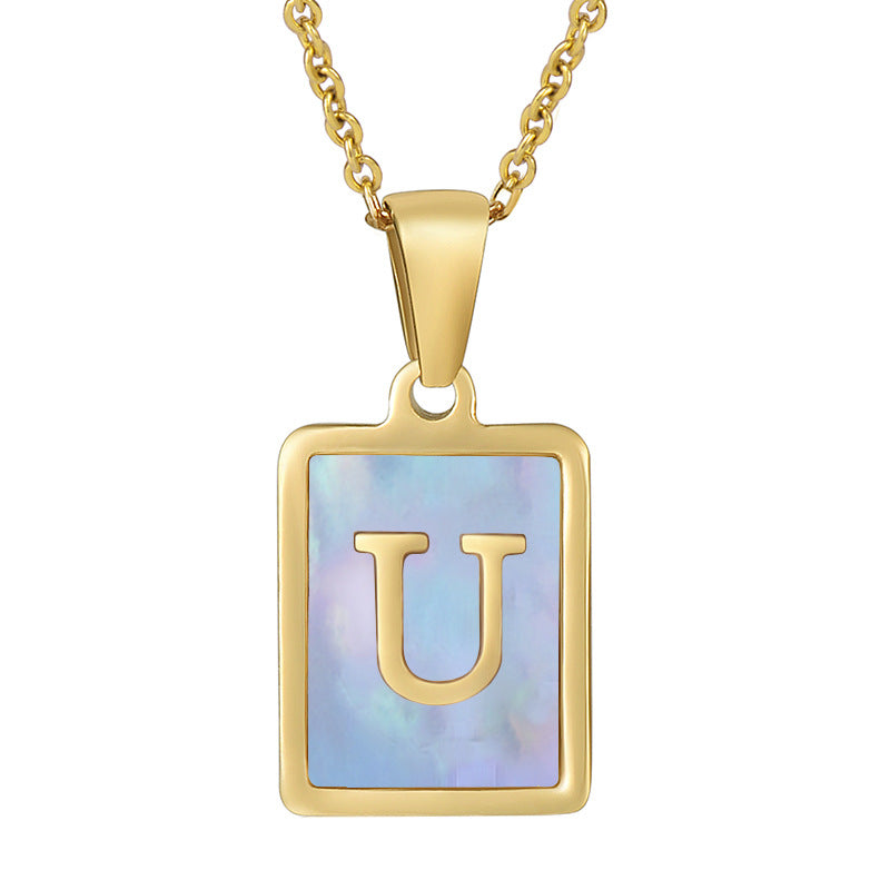 Collana titanio con lettera e conchiglia