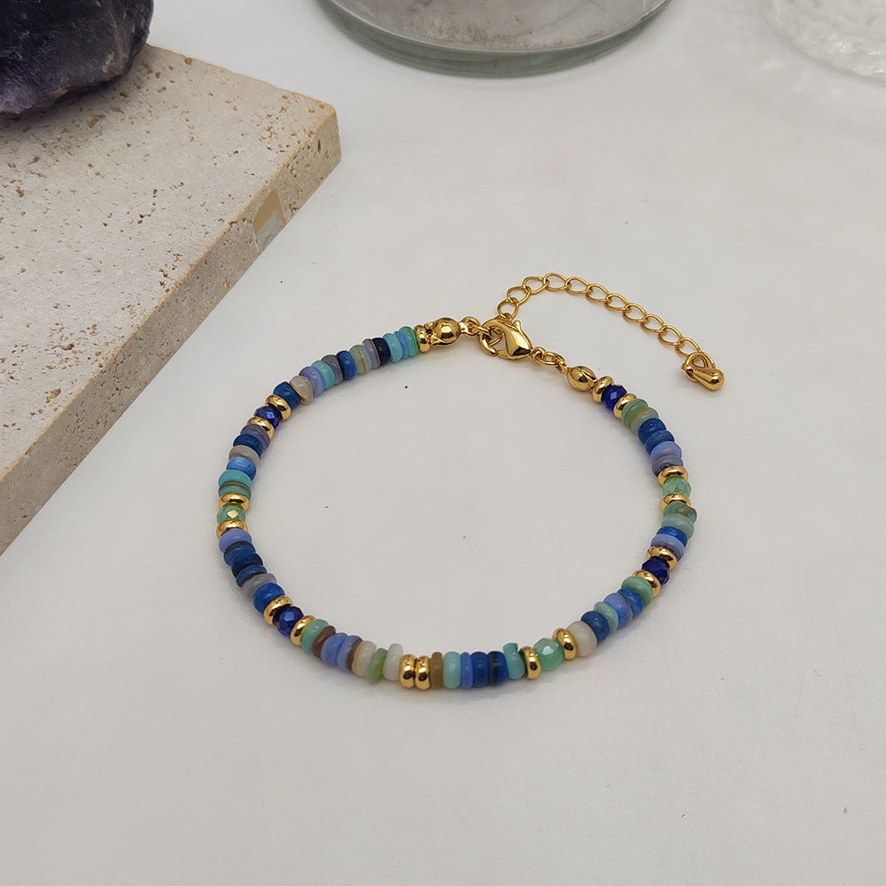 Bracciale conchiglia tessuto
