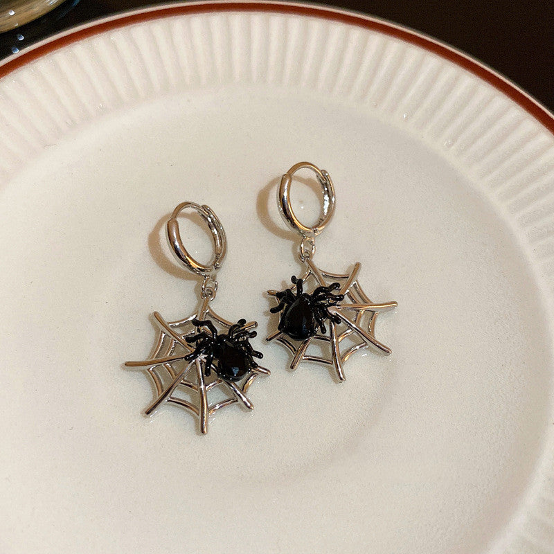 Orecchini geometrici con diamanti