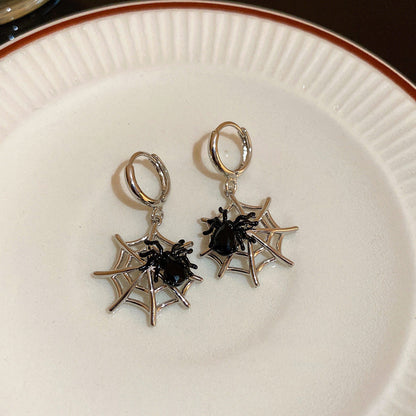 Orecchini geometrici con diamanti