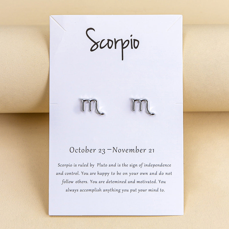 Orecchini segni zodiacali bicolori