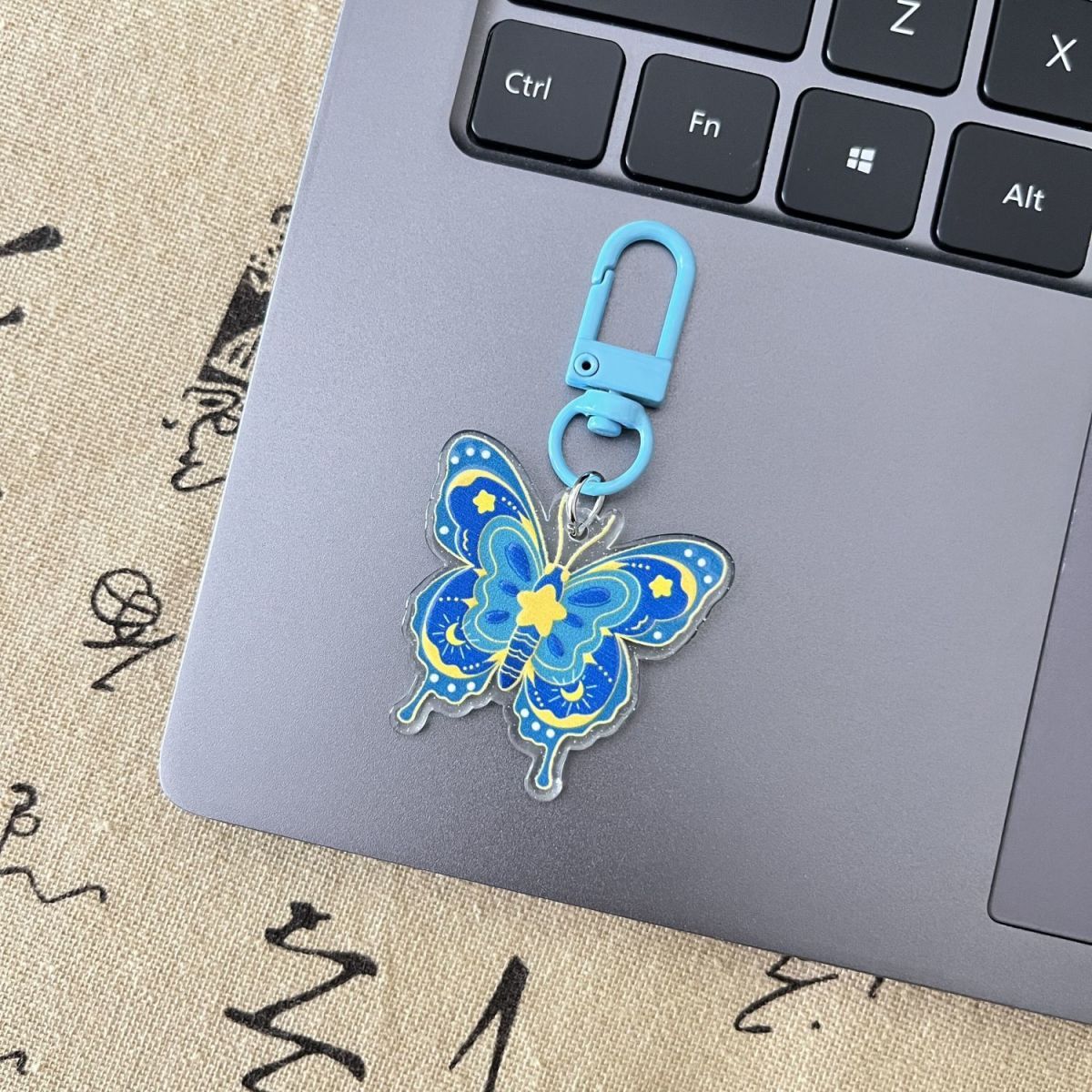 Charm cellulare doppio lato