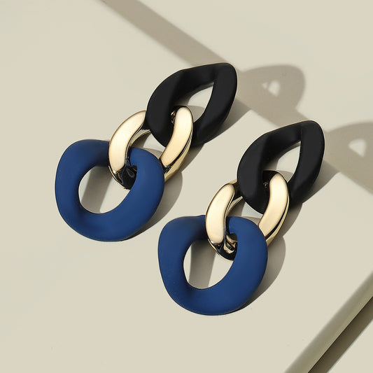 Orecchini geometrici bicolore da donna