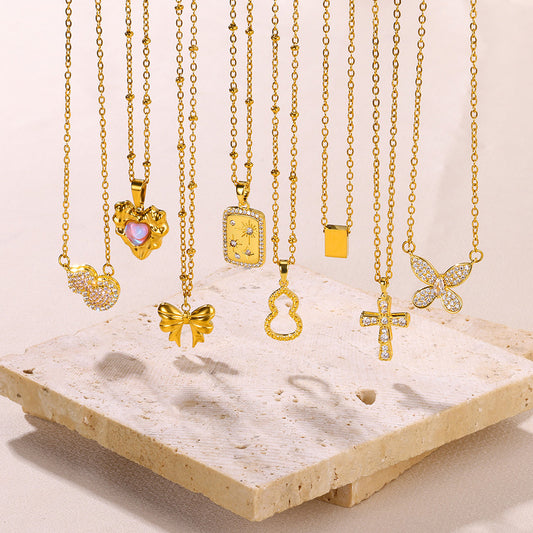 Collana farfalla croce a cuore