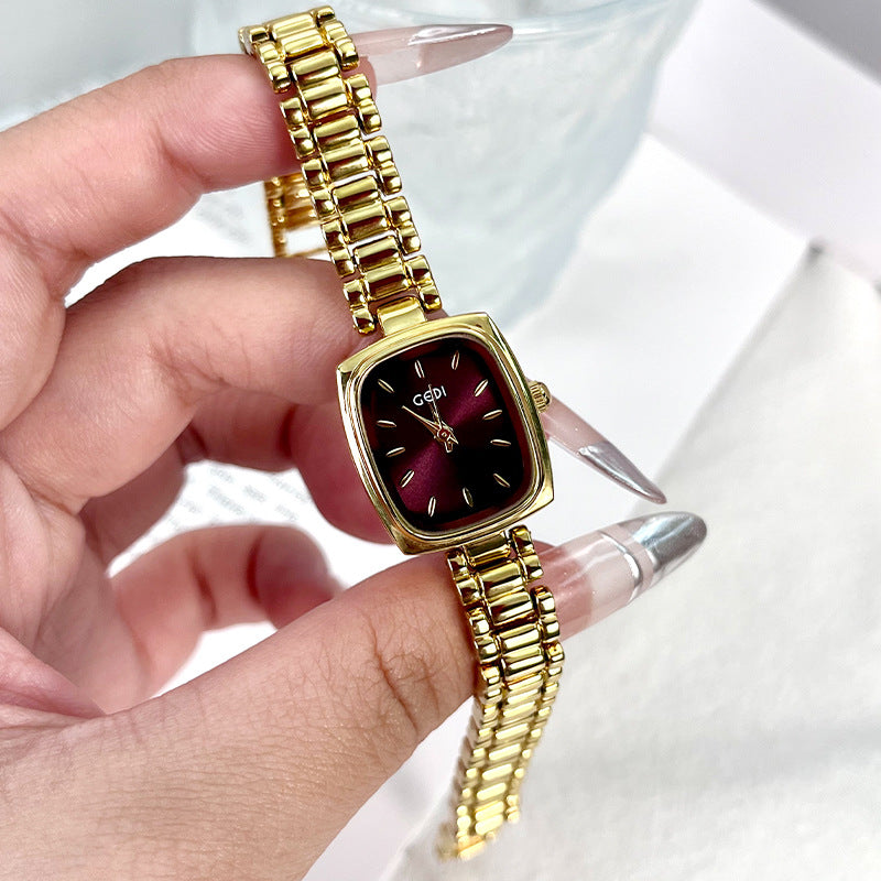 Orologio dorato piccolo