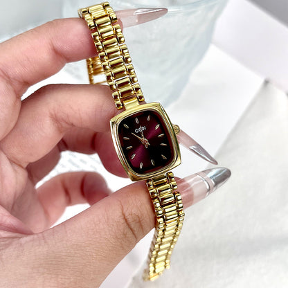 Orologio dorato piccolo