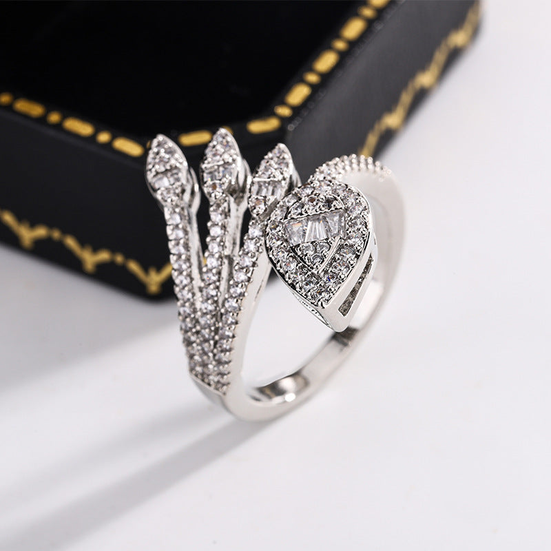 Anello foglie zirconi