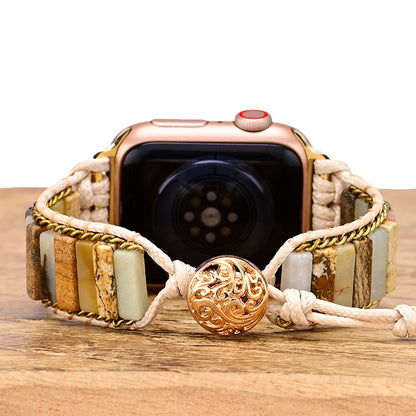 Orologio con cinturino intrecciato pietre