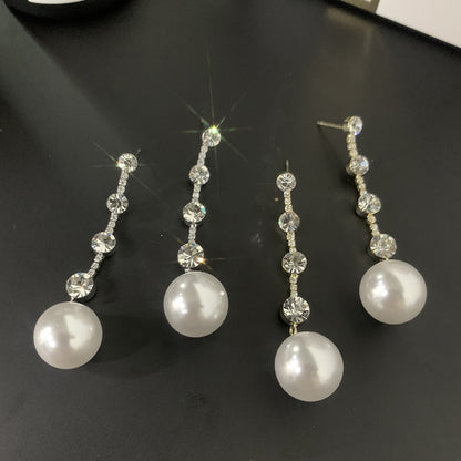Orecchini lunghi eleganti
