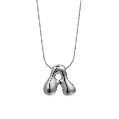 Collana lettera in ottone
