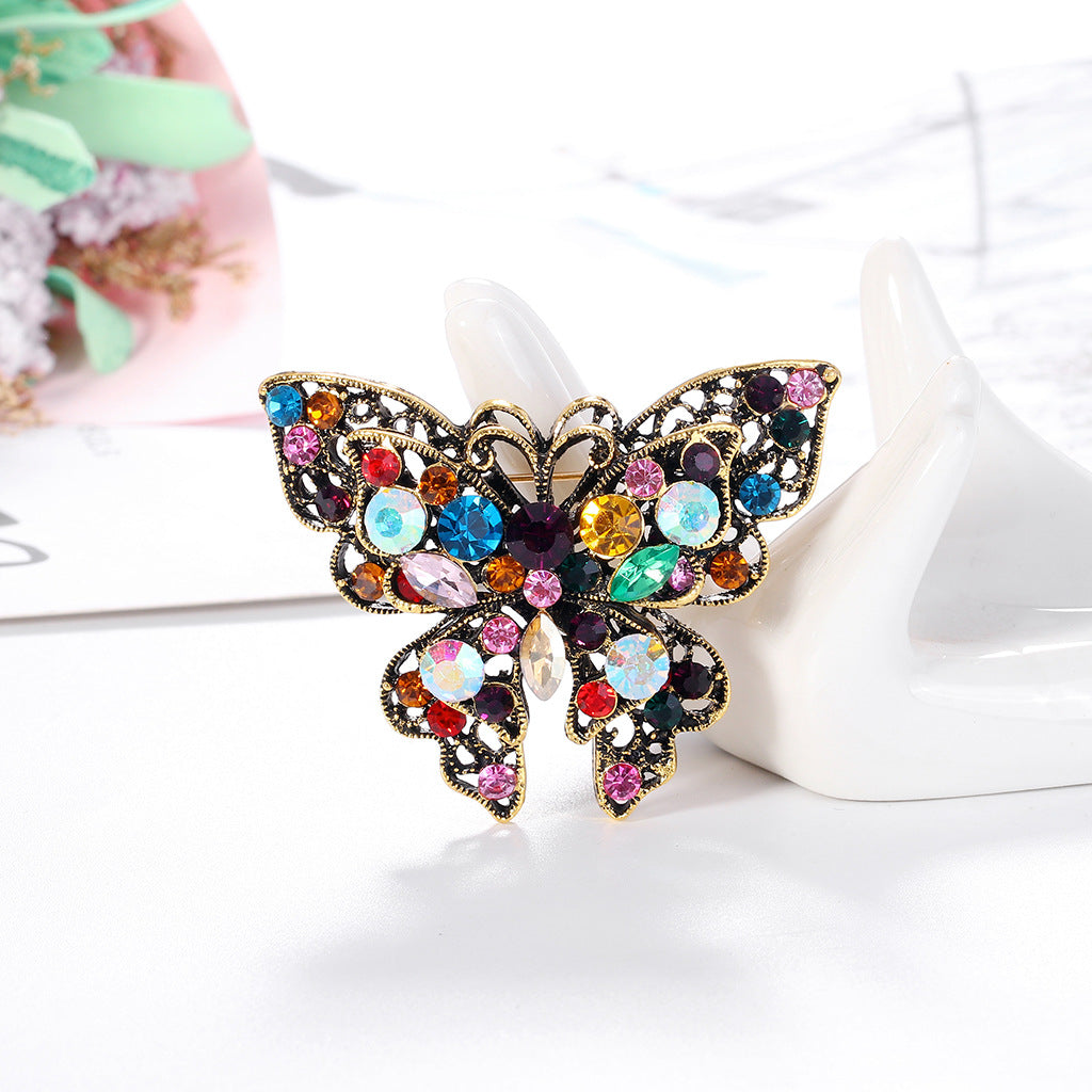 Spilla farfalla strass colorata
