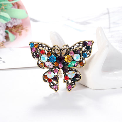 Spilla farfalla strass colorata