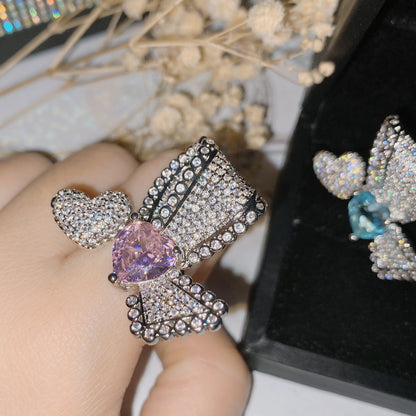 Anello farfalla asimmetrico
