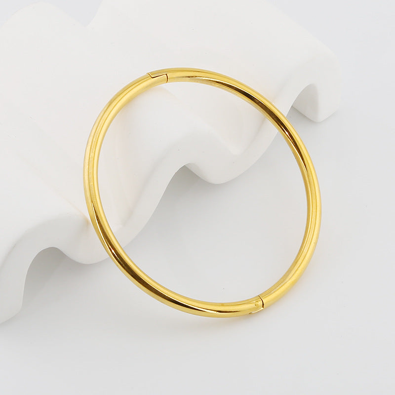 Braccialetto Titanio Oro