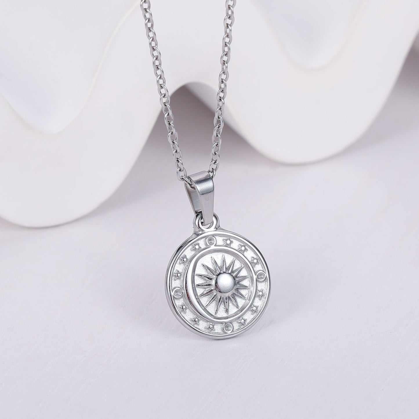 Collana sole luna bussola