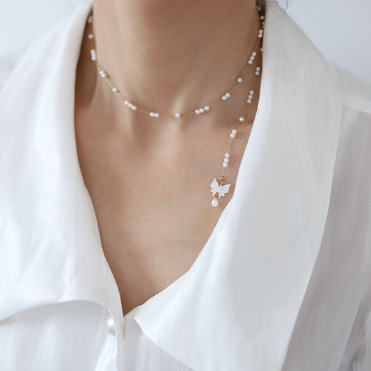 Collana con farfalla e perle