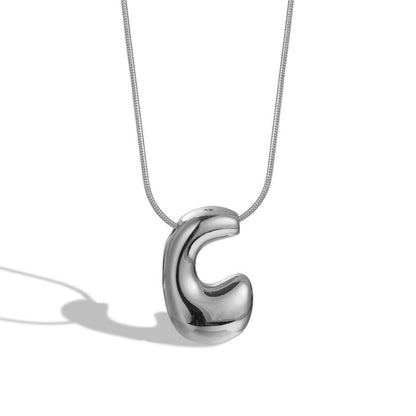 Collana lettera in ottone