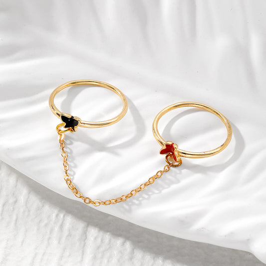Anello doppio farfalla