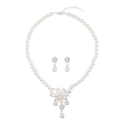 Collana e orecchini perle floreali
