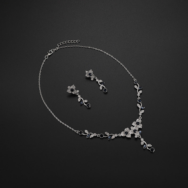 Collana e orecchini fiori e viti
