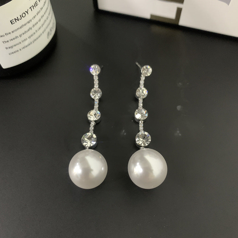 Orecchini lunghi eleganti
