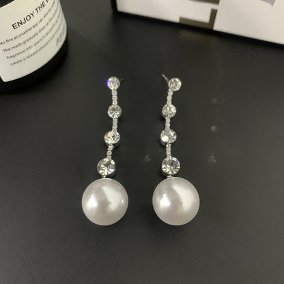 Orecchini lunghi eleganti