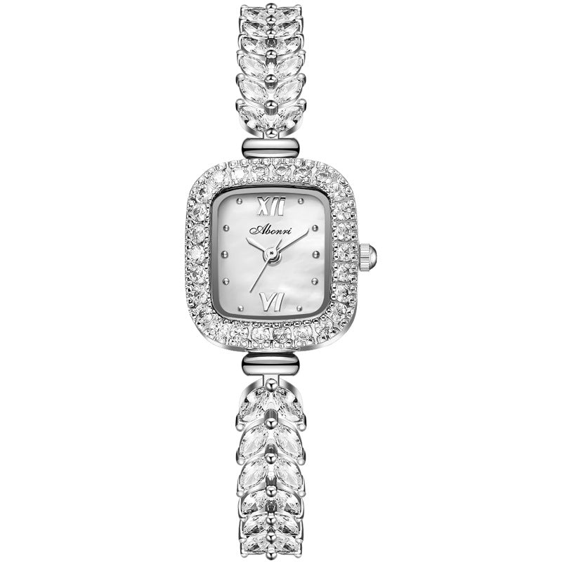 Orologio quadrato spike dorato