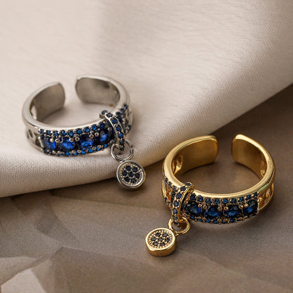 Anello geometrico aperto con zircone
