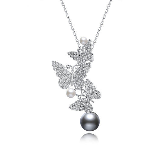 Collana farfalla con perla e fiore