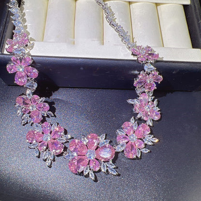 Set gioielli fiore con diamanti