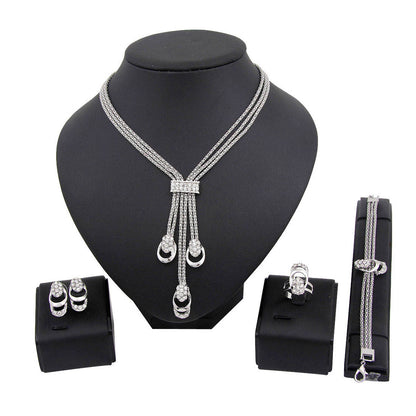 Set gioielli placcato oro quattro pezzi