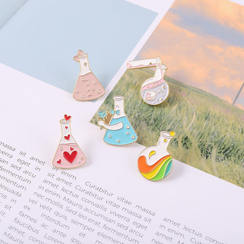 Spilla flacone arcobaleno