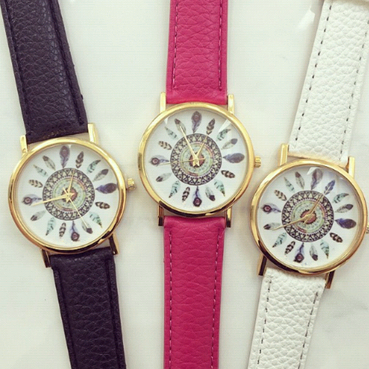 Orologio motivo pavone