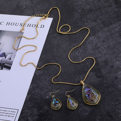 Set orecchini e collana resina