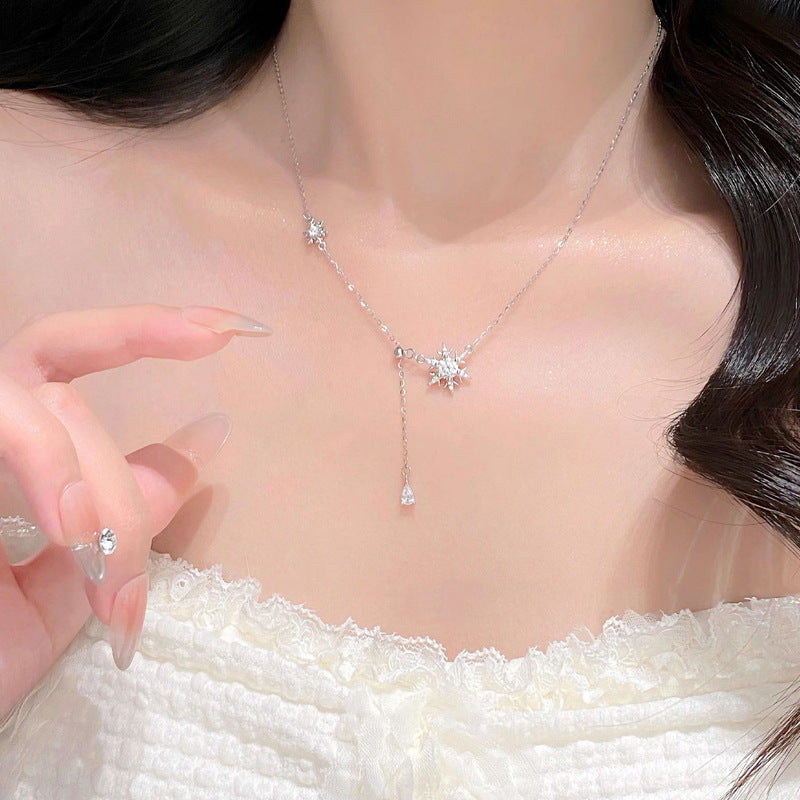 Collana fiocco di neve con nappa