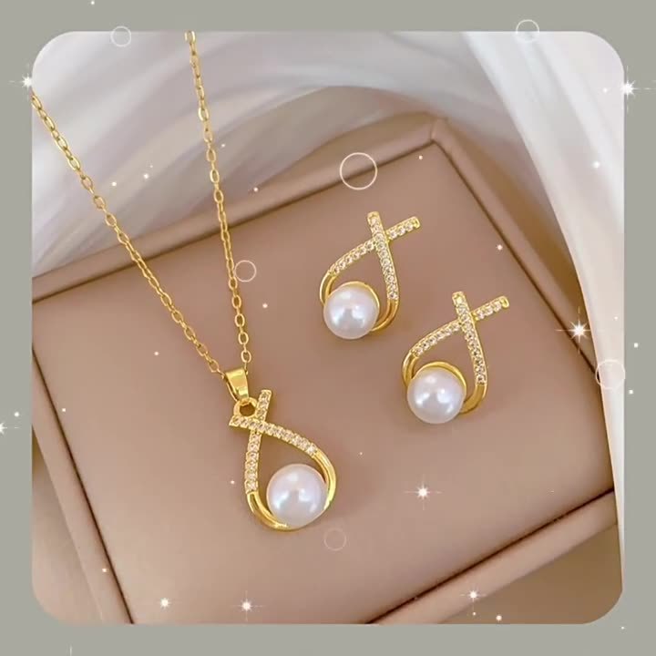 Collana croce con perla e strass