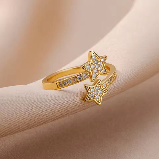 Anello stella aperto con zirconi