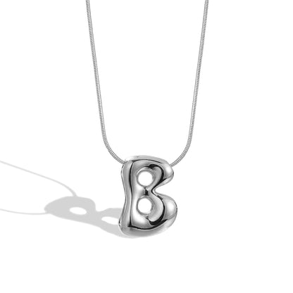 Collana lettera in ottone