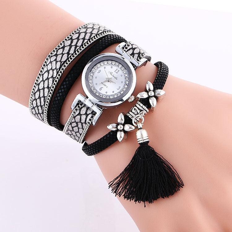 Orologio da donna con fiore e nappa