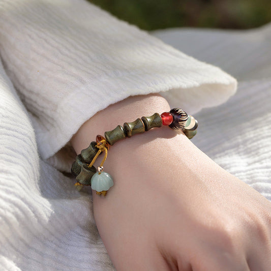 Bracciale bambù con pendente loto