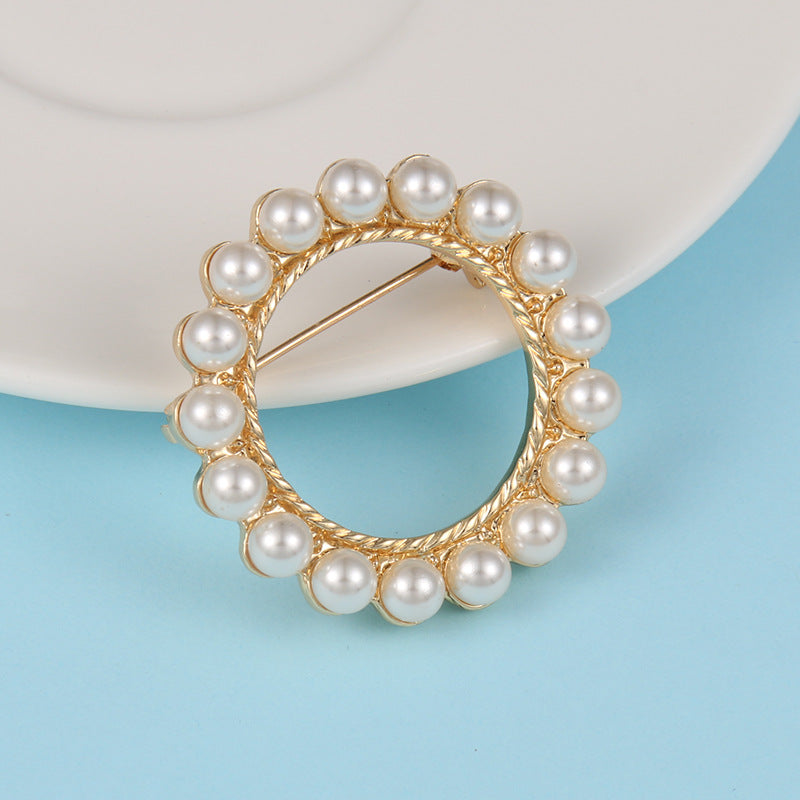 Spilla perla strass