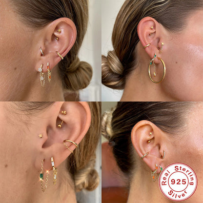Orecchini geometrici zircone con nappina