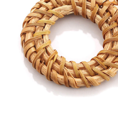 Orecchini rattan intrecciati con metallo
