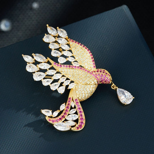 Spilla uccello zircone