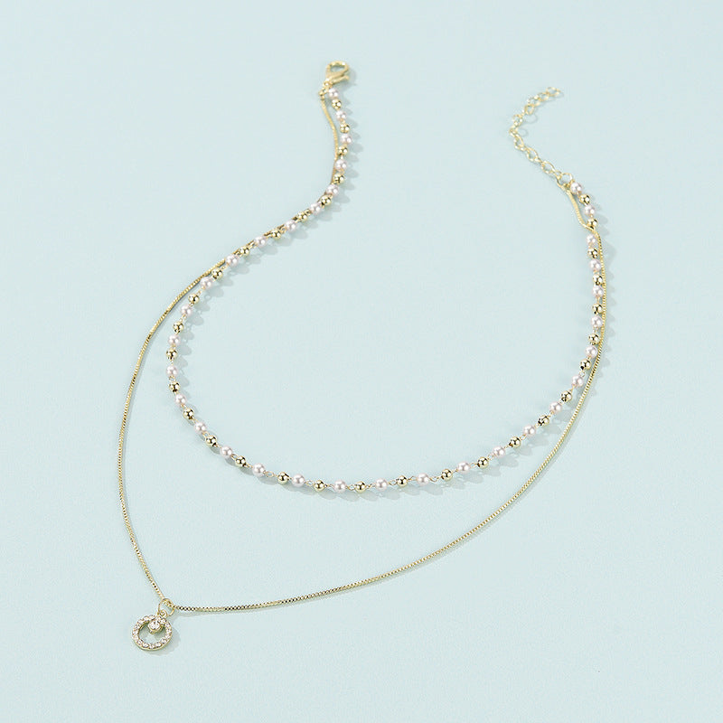 Collana anello doppia perla