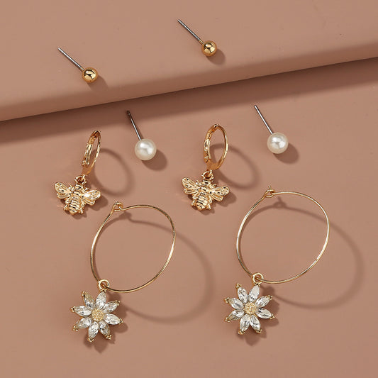 Set orecchini farfalla e girasole